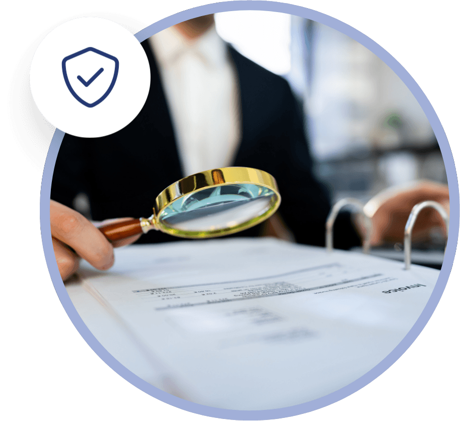 irs-tax-resolution-photo an IRS agent audits invoices