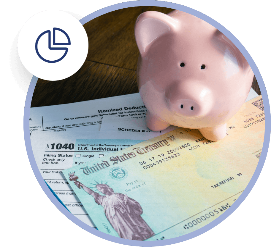 tax-planning-photo piggy bank placed on a tax refund check and tax forms, suggesting money savings as a result of tax planning