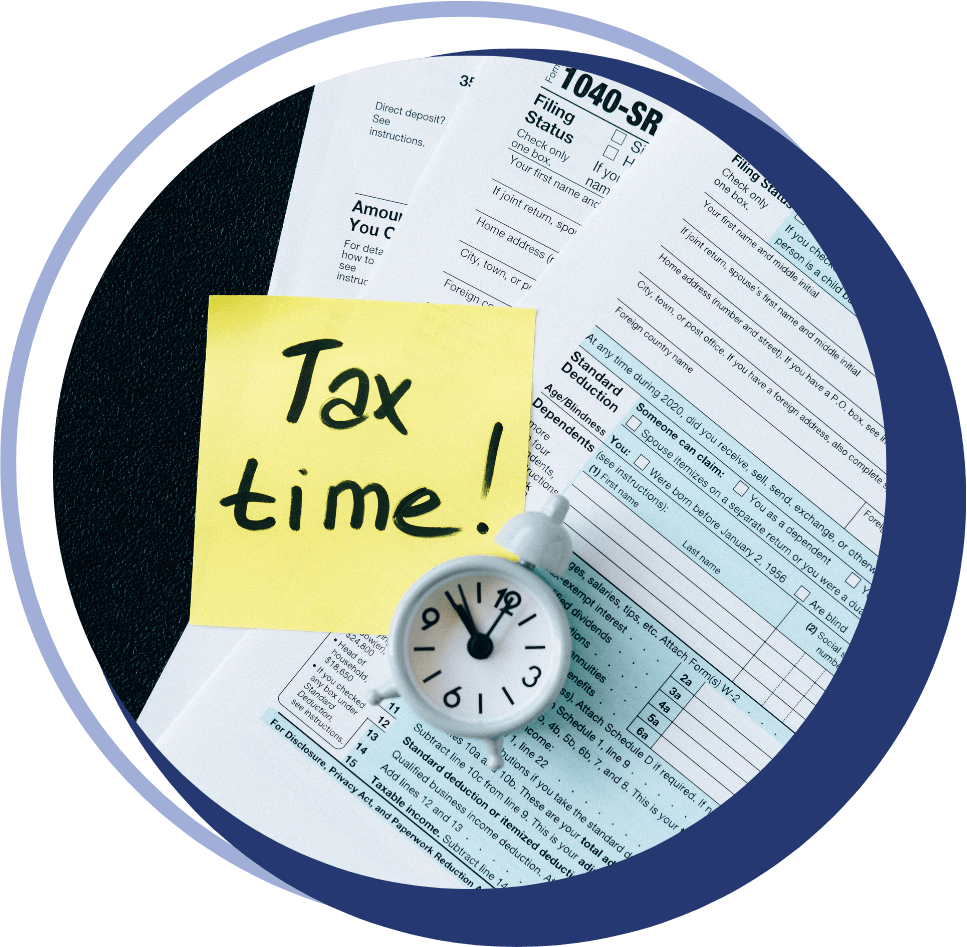 tax-time-photo Tax Time written on a sticky note stuck to tax forms, ready for completion by a professional tax preparer in North Port, FL