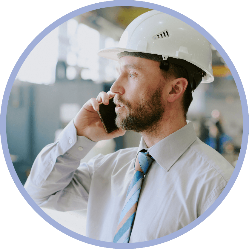 businessman-jobsite-phone-circle man in a white shirt and tie on a jobsite talking on the phone with his North Port accountant